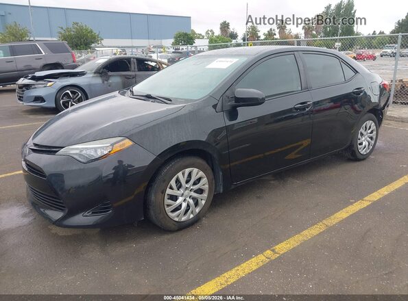 2T1BURHE4HC820570 2017 TOYOTA LL Черный Передняя левая четверть