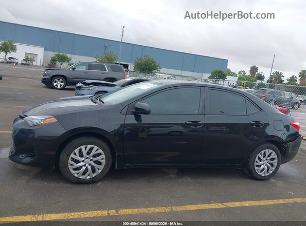 2T1BURHE4HC820570 2017 TOYOTA LL Черный Вид задней части салона