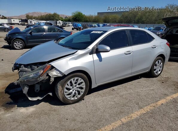 2T1BURHE4HC843430 2017 TOYOTA COROLLA Silver Vista tres cuartos delantera izquierda
