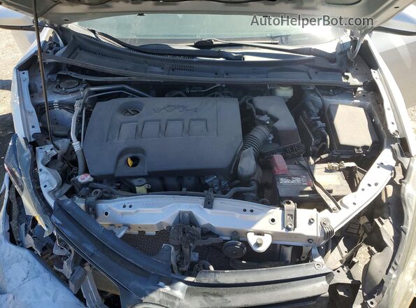 2T1BURHE4HC843430 2017 TOYOTA COROLLA Silver Vista interior trasera