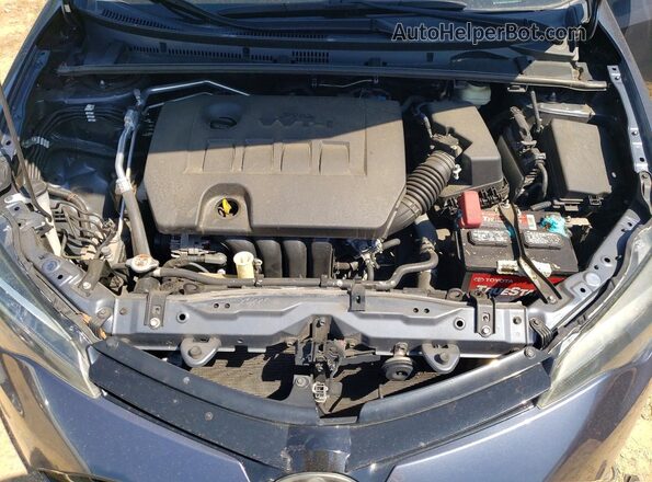 2T1BURHE4JC965579 2018 TOYOTA COROLLA Gray Vista interior trasera