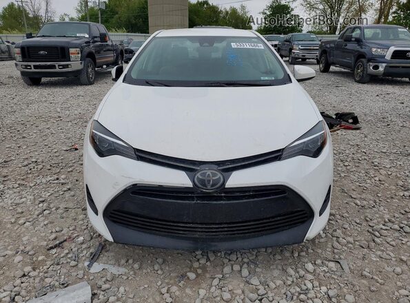 2T1BURHE4KC242512 2019 TOYOTA COROLLA Белый Вид спереди
