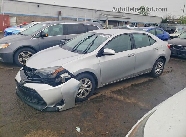 2T1BURHE5HC762064 2017 TOYOTA COROLLA Серебряный Передняя левая четверть
