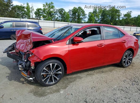2T1BURHE5HC930219 2017 TOYOTA COROLLA Red Vista tres cuartos delantera izquierda
