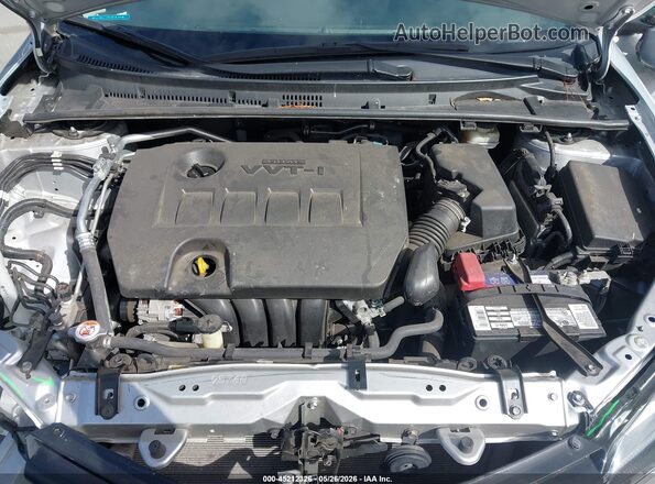 2T1BURHE5JC017577 2018 TOYOTA COROLLA Silver Vista trasera