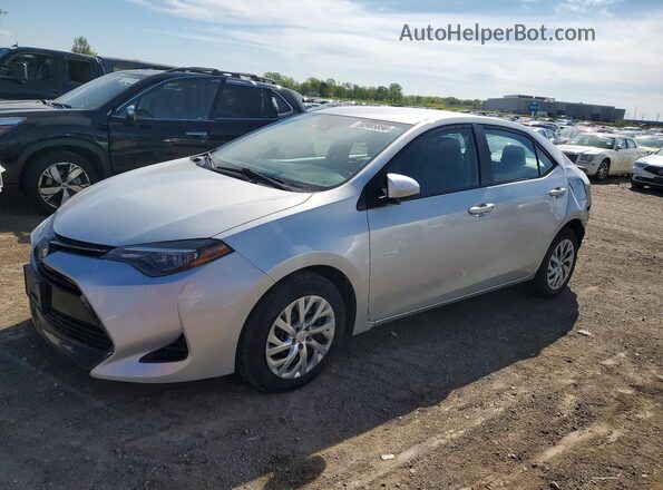2T1BURHE5KC140409 2019 TOYOTA COROLLA Серебряный Передняя левая четверть