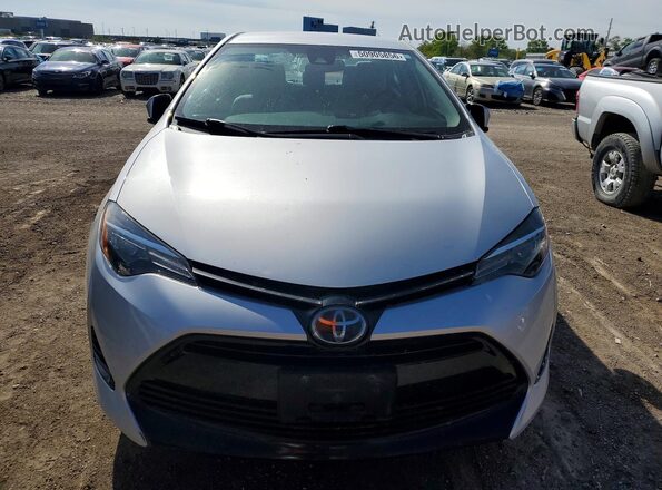 2T1BURHE5KC140409 2019 TOYOTA COROLLA Серебряный Вид спереди
