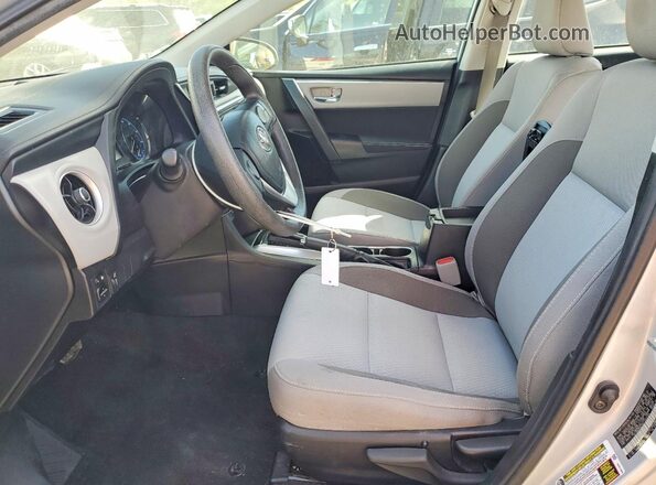 2T1BURHE5KC140409 2019 TOYOTA COROLLA Серебряный Вид салона спереди