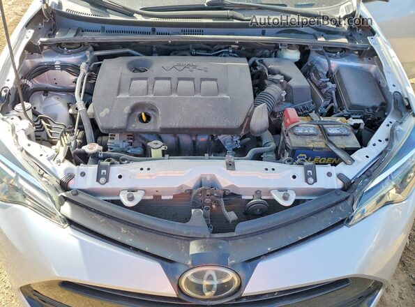 2T1BURHE5KC140409 2019 TOYOTA COROLLA Серебряный Вид задней части салона