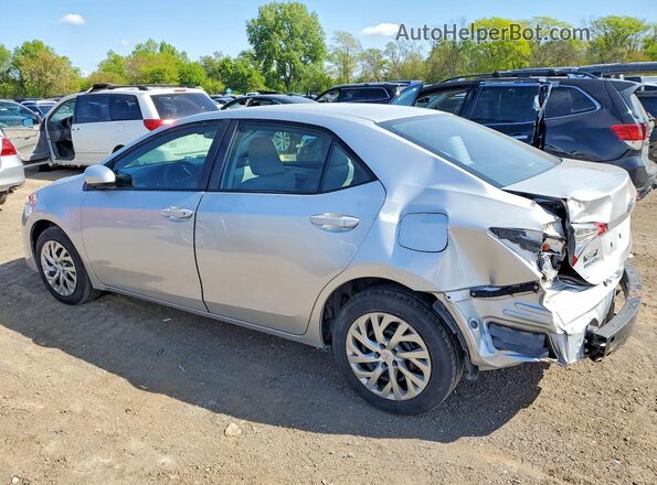 2T1BURHE5KC140409 2019 TOYOTA COROLLA Серебряный Задняя левая четверть