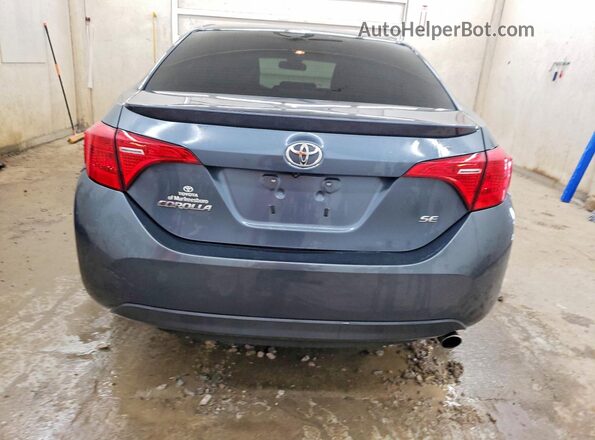 2T1BURHE6HC788950 2017 TOYOTA COROLLA Серый Вид сзади