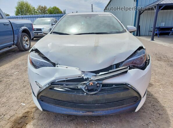 2T1BURHE6HC884724 2017 TOYOTA COROLLA Белый Вид спереди