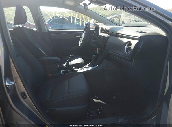 2T1BURHE6JC107370 2018 TOYOTA LL Gold Widok wnętrza z przodu
