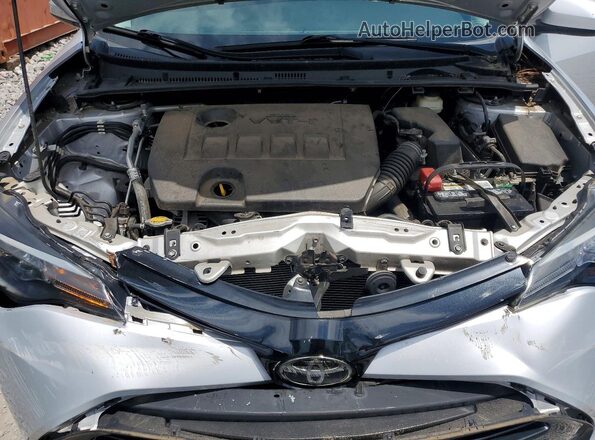 2T1BURHE7HC780212 2017 TOYOTA COROLLA Серебряный Вид задней части салона