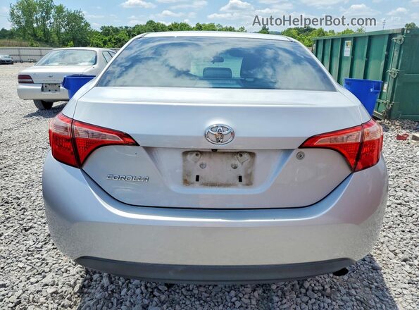 2T1BURHE7HC780212 2017 TOYOTA COROLLA Серебряный Вид сзади