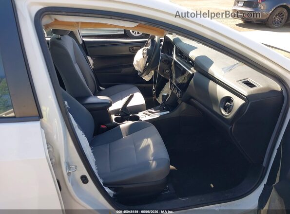 2T1BURHE7KC195038 2019 TOYOTA LL Белый Вид салона спереди