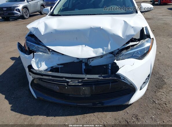 2T1BURHE7KC195038 2019 TOYOTA LL Белый Вид спереди