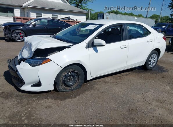 2T1BURHE7KC195038 2019 TOYOTA LL Белый Передняя левая четверть