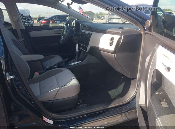 2T1BURHE8HC861624 2017 TOYOTA COROLLA Dark Blue Vista interior delantera