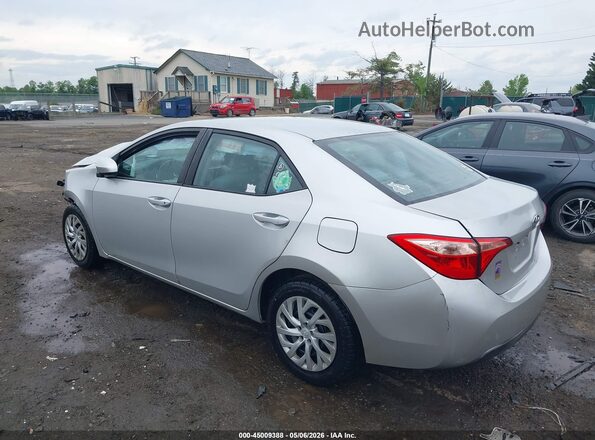 2T1BURHE8HC879525 2017 TOYOTA LL Silver Trasero izquierdo