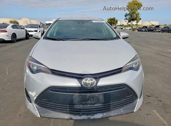 2T1BURHE8HC928335 2017 TOYOTA COROLLA Silver Вид спереду