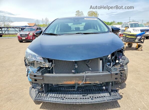 2T1BURHE8JC057104 2018 TOYOTA COROLLA Синий Вид спереди