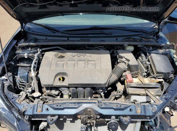 2T1BURHE8JC057104 2018 TOYOTA COROLLA Синий Вид задней части салона
