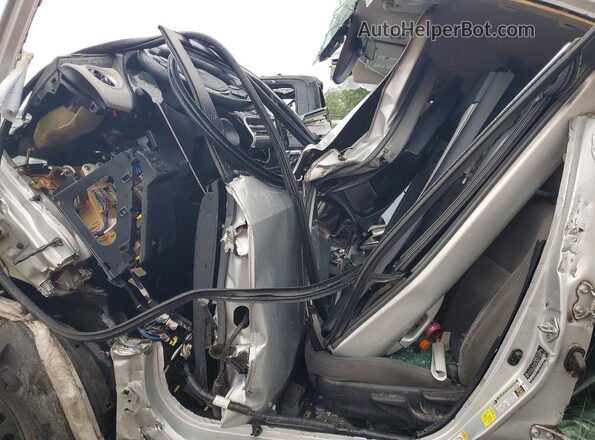 2T1BURHE8JC085694 2018 TOYOTA COROLLA Серебряный Вид салона спереди