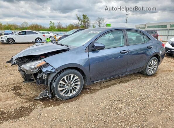 2T1BURHE9JC974651 2018 TOYOTA COROLLA Серый Передняя левая четверть