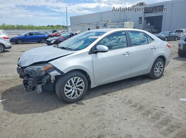 2T1BURHE9JC983561 2018 TOYOTA LL Серебряный Передняя левая четверть