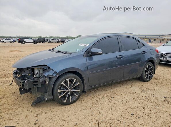 2T1BURHE9KC177902 2019 TOYOTA COROLLA Gray Vista tres cuartos delantera izquierda
