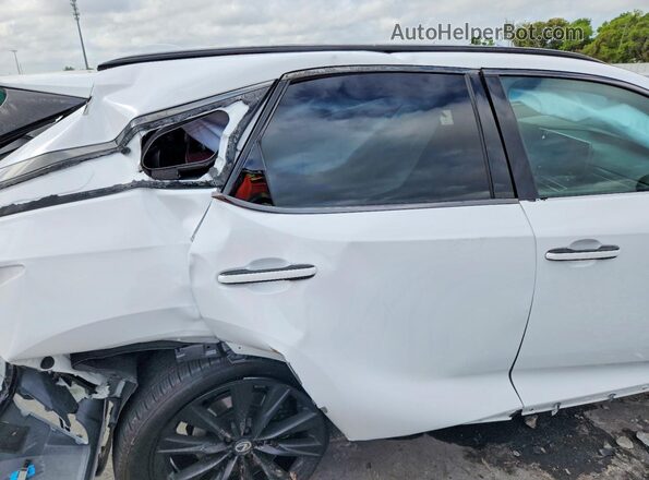 2T2BCMEA6TC023328 2026 LEXUS RX White Widok wnętrza z tyłu