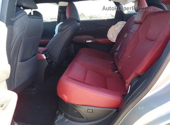 2T2BCMEAXPC007493 2023 LEXUS RX Silver Widok wnętrza z tyłu