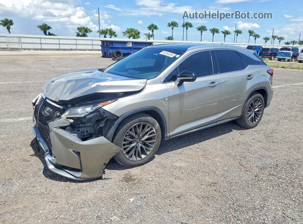 2T2BZMCA0HC064823 2017 LEXUS RX Золотой Передняя левая четверть