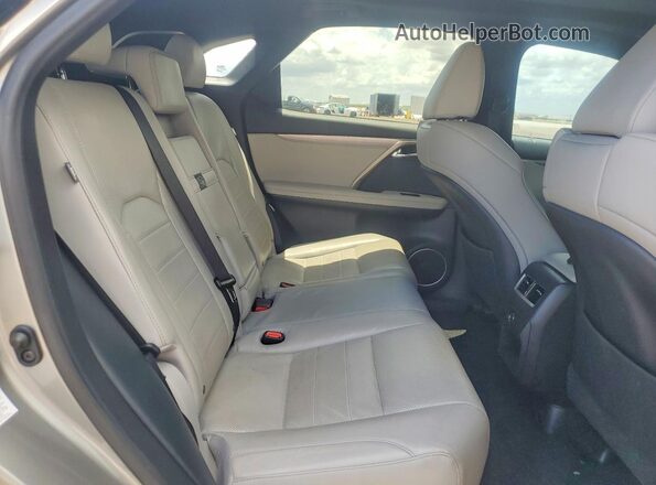 2T2BZMCA0HC064823 2017 LEXUS RX Золотой Вид задней части салона