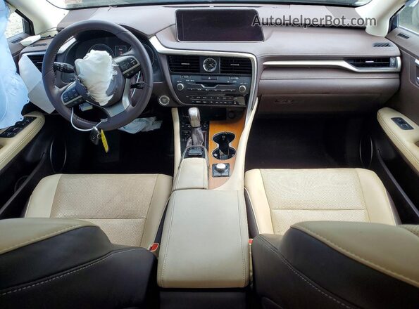 2T2BZMCA2HC127338 2017 LEXUS RX Бежевый Вид панели приборов