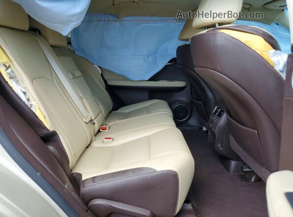 2T2BZMCA2HC127338 2017 LEXUS RX Бежевый Вид задней части салона