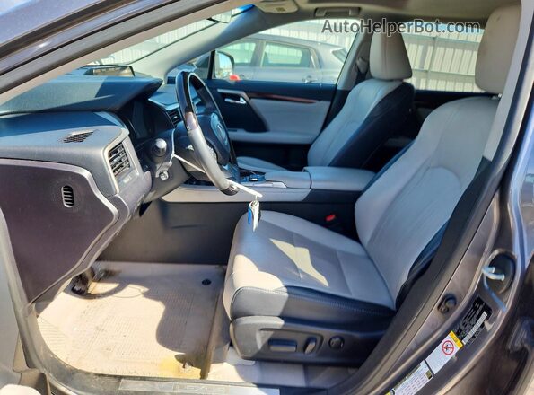 2T2BZMCA2JC151709 2018 LEXUS RX Серебряный Вид салона спереди