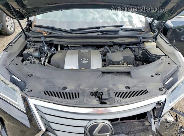 2T2BZMCA4HC088770 2017 LEXUS RX Черный Вид задней части салона