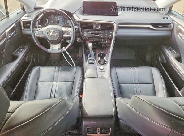 2T2BZMCA9JC138259 2018 LEXUS RX Серый Вид панели приборов