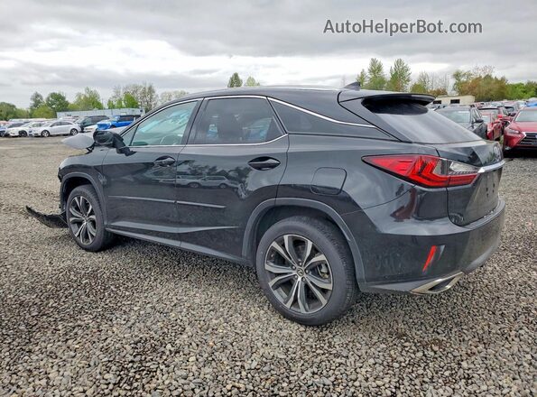 2T2BZMCA9KC200566 2019 LEXUS RX Black Trasero izquierdo