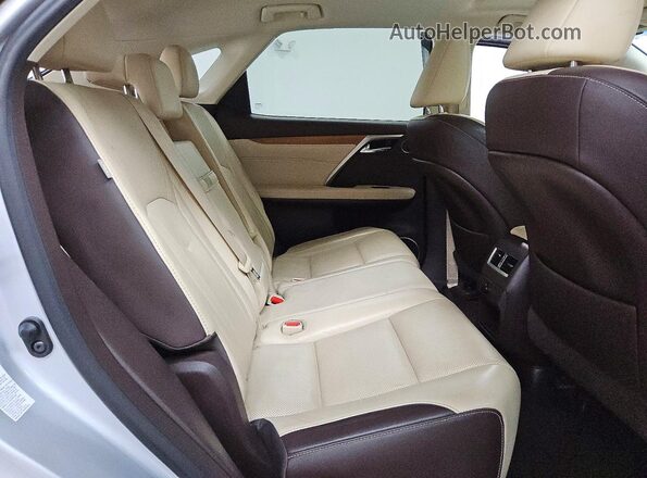 2T2BZMCAXHC069088 2017 LEXUS RX Silver Vista interior trasera
