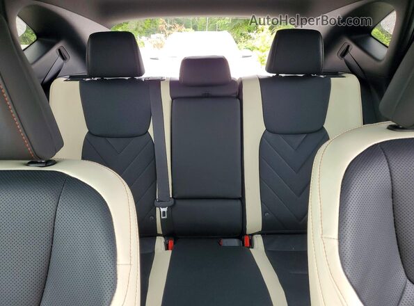 2T2HKCEZ8PC013466 2023 LEXUS NX Silver Vista de los asientos traseros