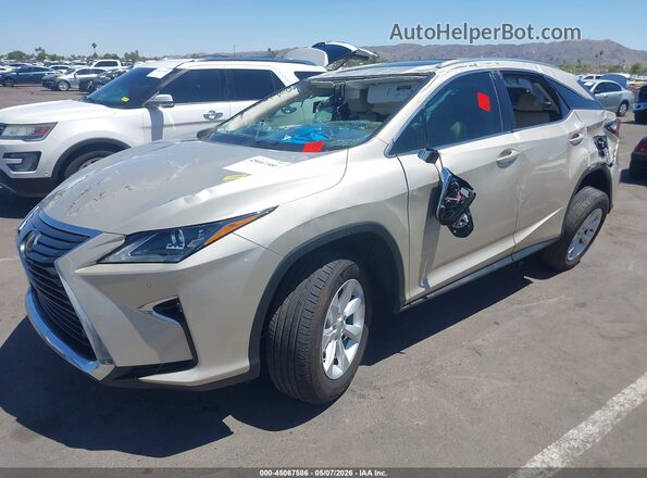 2T2ZZMCA2HC044054 2017 LEXUS RX 350 Золотой Передняя левая четверть