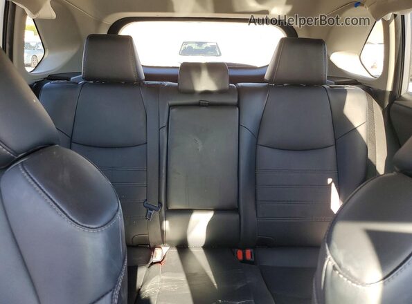 2T3B6RFV2RW047425 2024 TOYOTA RAV4 Silver Вид задніх сидінь