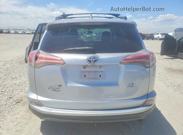 2T3BFREV2GW424236 2016 TOYOTA RAV4 Серебряный Вид сзади