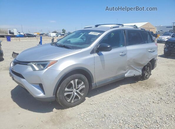 2T3BFREV2GW424236 2016 TOYOTA RAV4 Серебряный Передняя левая четверть