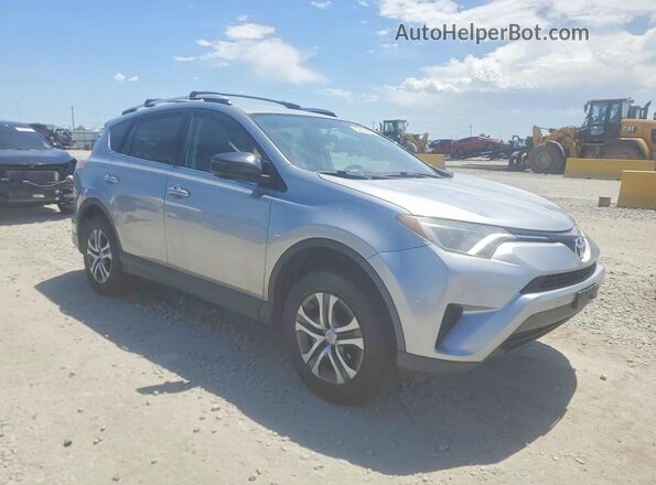 2T3BFREV2GW424236 2016 TOYOTA RAV4 Серебряный Передняя правая четверть