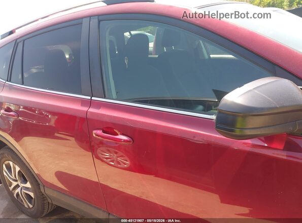 2T3BFREV2JW756832 2018 TOYOTA RAV4 Red Widok wnętrza z tyłu