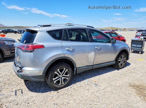 2T3BFREV3HW619912 2017 TOYOTA RAV4 Silver Trasero derecho